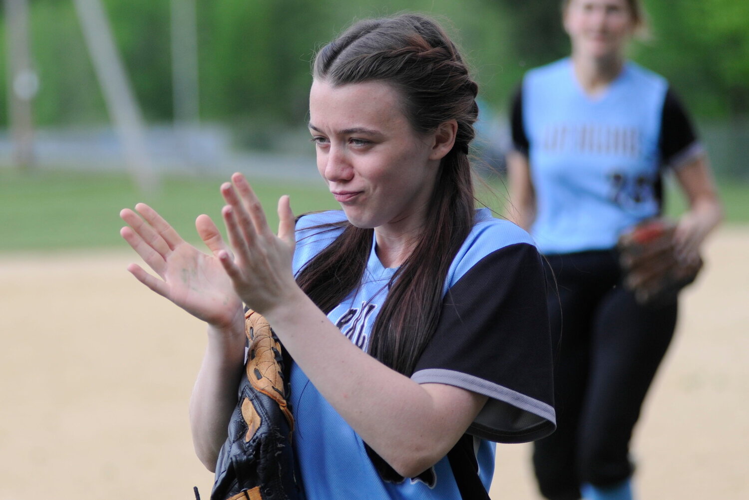 Applause, please. Sullivan West’s third baseman, Hannah Abplanalp, reacts to her team scoring to take a 4-1 lead going into the seventh frame.